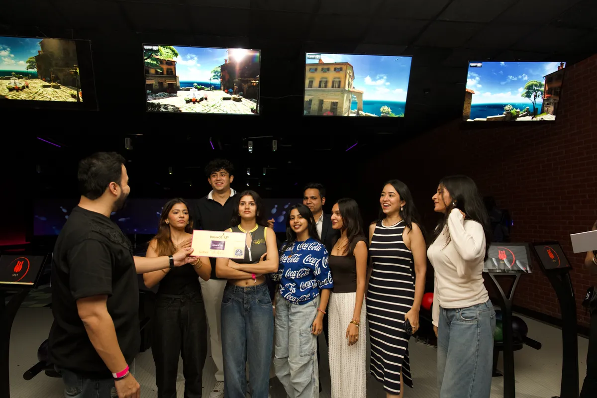 Strike Social guests with their prize