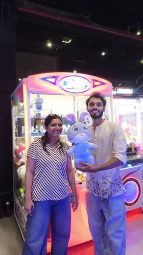 BounceUp winner with their prize